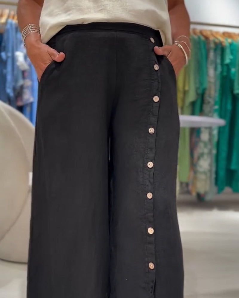 Pantalones casuales holgados de botonadura sencilla
