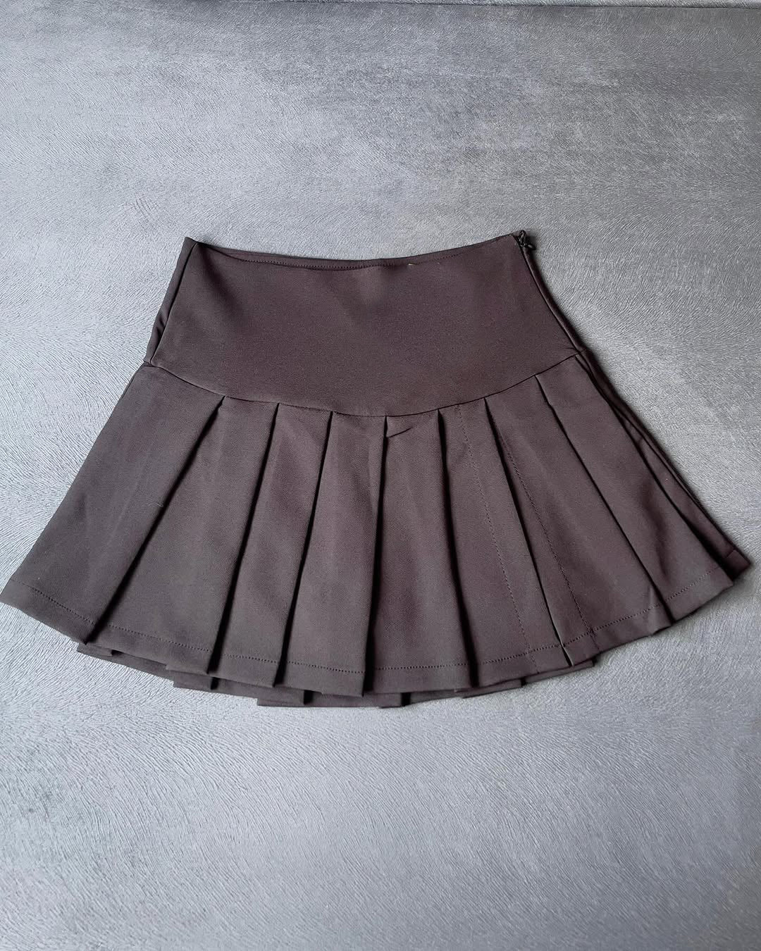 Falda corta plisada mini