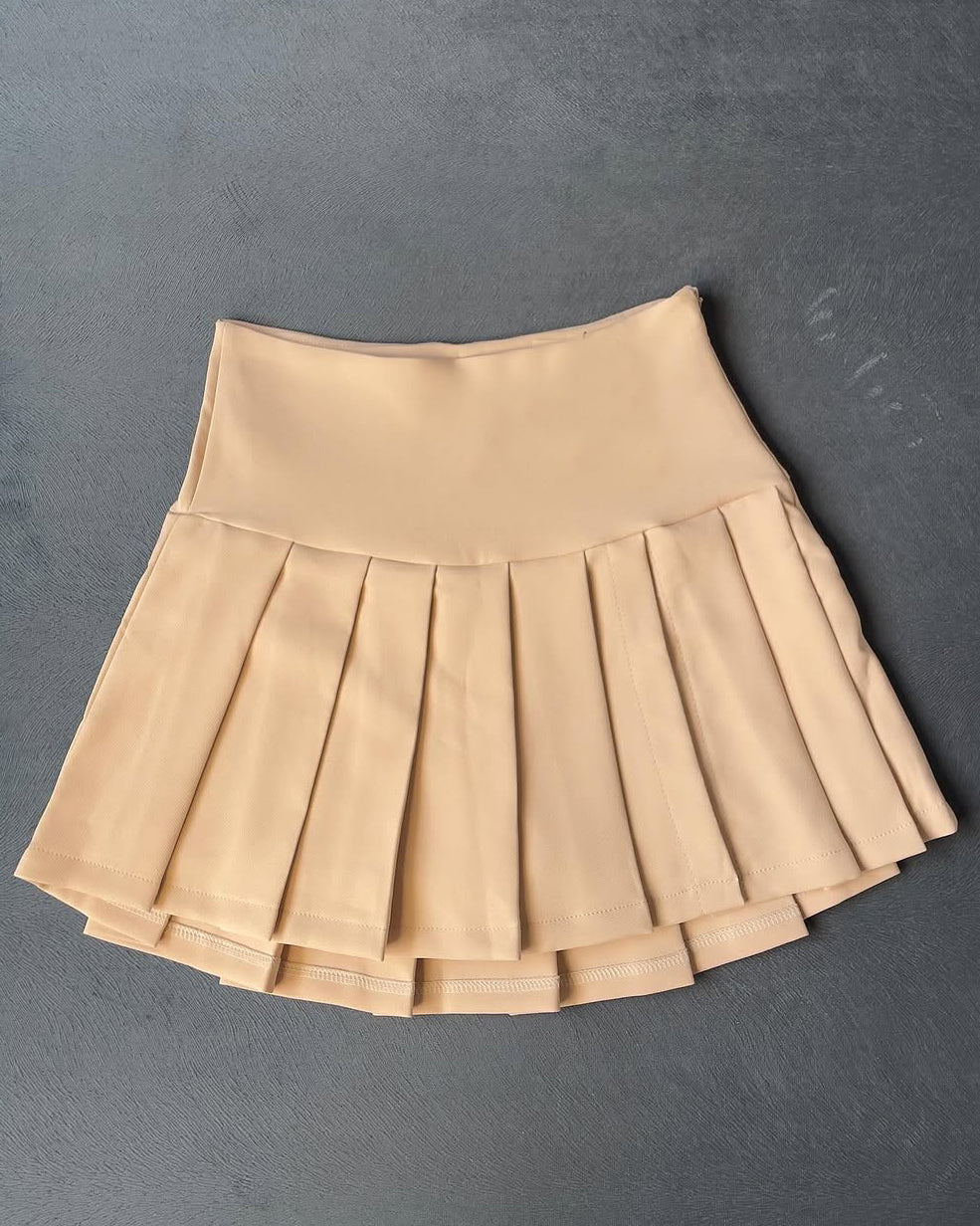 Falda corta plisada mini