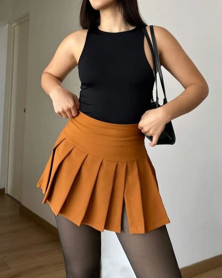 Falda corta plisada mini