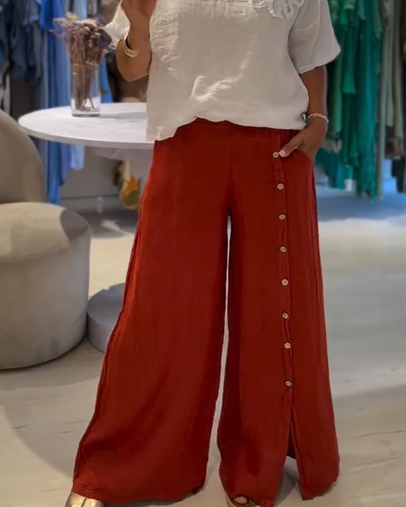 Pantalones casuales holgados de botonadura sencilla