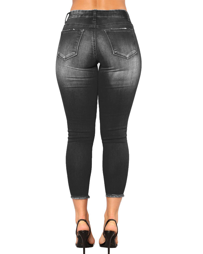Pantalones vaqueros rasgados de mujer