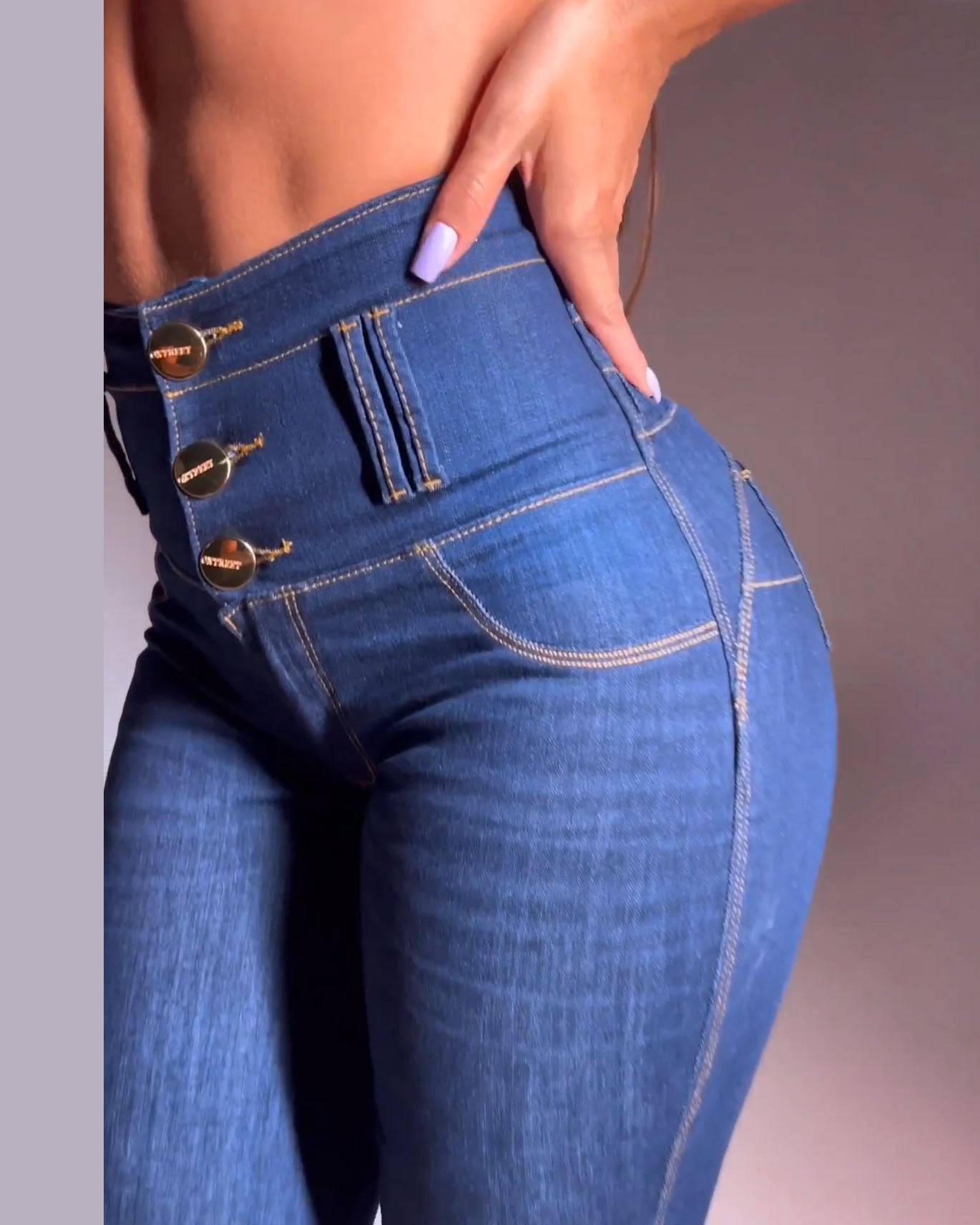 Pantalones elásticos de tiro alto Jeans ajustados