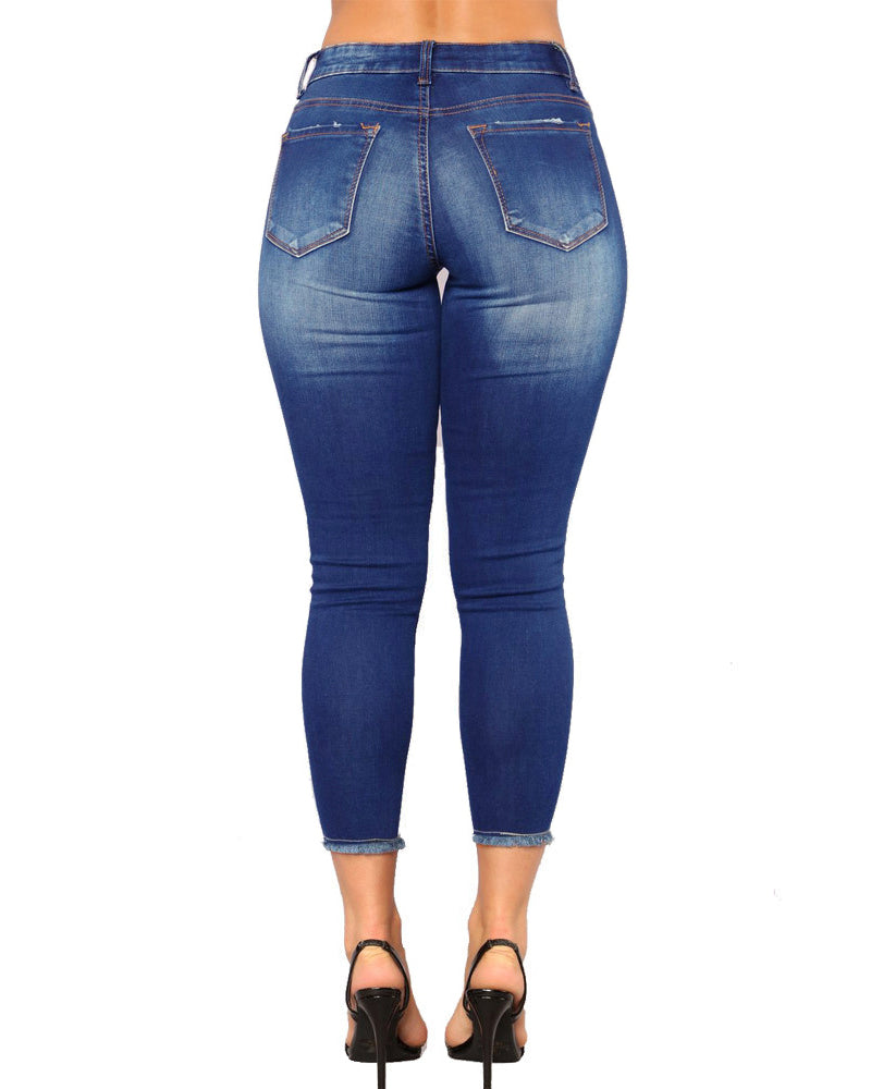 Pantalones vaqueros rasgados de mujer